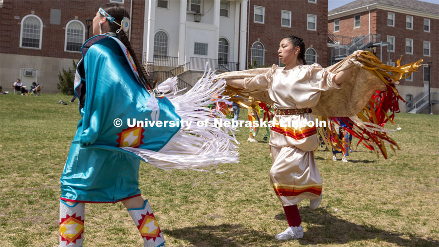Stevie Horse (left) and Tally Redboy dance during the UNITE powwow. 2022 UNITE powwow to honor graduates (K through college). Held April 23 on the greenspace along 17th Street, immediately west of the Willa Cather Dining Center. This was UNITE’s first powwow in three years. The MC was Craig Cleveland Jr. Arena director was Mike Wolfe Sr. Host Northern Drum was Standing Horse. Host Southern Drum was Omaha White Tail. Head Woman Dancer was Kaira Wolfe. Head Man Dancer was Scott Aldrich. Special contest was a Potato Dance. April 23, 2023. Photo by Troy Fedderson / University Communication.